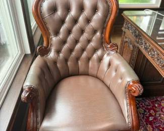 Leather desk chair on wheels
