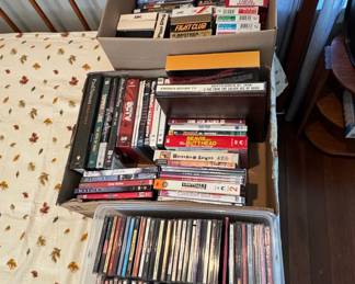 Assorted Media Collection (DVDs, CDs, and VHS)