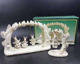 Jade collection swinging rabbits