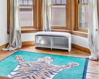 Tiger-motif area rug, white upholstered storage bench