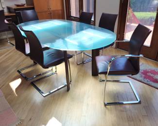 Blue, frosted dining table w pop-up leaf. 79" x 42". extends to 98" with leaf