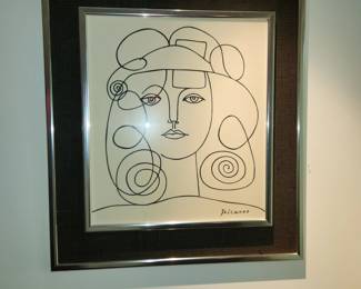 Basement office Picasso art