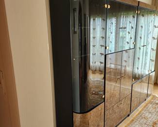 Main floor large display cabinet by EUROPA Group. 103" wide x 78" tall x 20" deep. 4 pieces