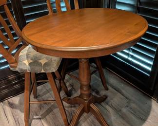 PAIR OF CANADIAN SOLID WOOD PUB TABLES (WILL SELL WITH CHAIRS AS 2 OR 4) - 35" ROUND, 43" H