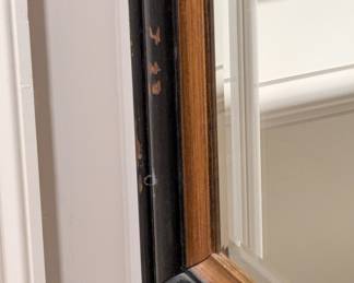 DETAIL: LARGE BLACK AND GOLD DISTRESSED WALL MIRROR - 52"H x 39"W