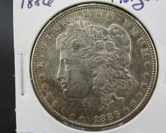 Lot 288. 1886 Morgan Silver Dollar with toning