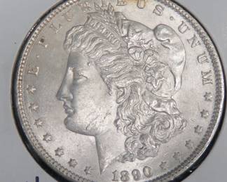 Lot 299. 1890 Morgan Silver Dollar with mild toning