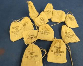 Lot 153. 12 bags of 15 BU pennies each (180 total) from the 1960s and 1970s from the Bureau of the Mint