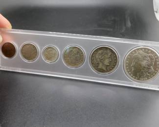 Lot 31. Six-coin 1902 type set including penny, nickel, dime, quarter, half, and dollar.