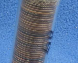 Lot 205. Tube of 50 circulated Indian Head Cents from the 1880s.