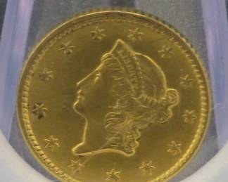 Lot 20. 1853 90% Gold Liberty $1 coin with total weight of 1.672 grams