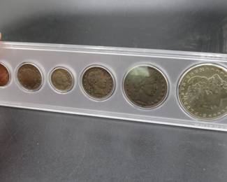 Lot 41. Six-coin 1899 type set including penny, nickel, dime, quarter, half, and dollar.