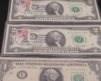 Lot 99. Two Series 1976 $2 bill First Day Covers dated April 13, 1976, and one $1 Star Federal Reserve Note