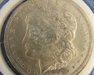Lot 244. 1884 S Morgan Silver Dollar