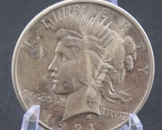 Lot 238. 1921 P High relief Peace Dollar. Semi-key date