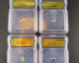 Lot 15. Four gold nuggets slabbed and graded ICG Genuine with approx. 85% gold and total weight of all four being 2.59 grams
