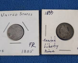 Lot 194. Two Seated Liberty dimes: 1885 with some damage, and 1877 in good condition