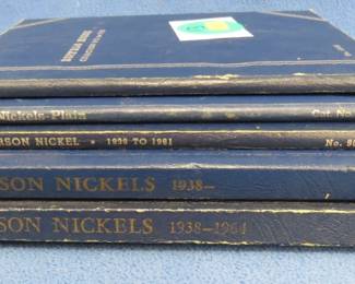 Lot 113. One Buffalo Nickel album with 5 nickels and four partially full Jefferson Nickel albums beginning 1938