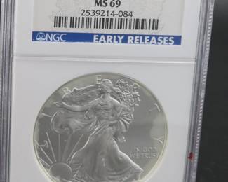 Lot 12. 2010 Early Release Silver Eagle $1 coin with one troy oz. of fine silver slabbed and graded NGC MS 69