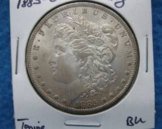 Lot 89. 1885 O Morgan silver dollar