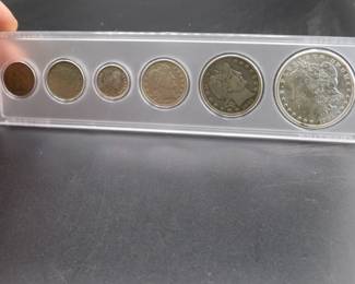 Lot 40. Six-coin 1901 type set including penny, nickel, dime, quarter, half, and dollar. A type set is a coin collection from a single year based one coin design or type rather than specific dates or mint marks.