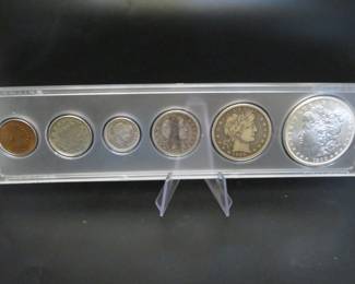 Lot 30. Six-coin 1900 type set including penny, nickel, dime, quarter, half, and dollar. A type set is a coin collection from a single year based one coin design or type rather than specific dates or mint marks.