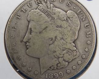 Lot 245. 1899 S Morgan Silver Dollar
