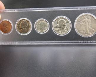 Lot 79. Five-coin 1946 type set including penny, nickel, dime, quarter, and half dollar coins.