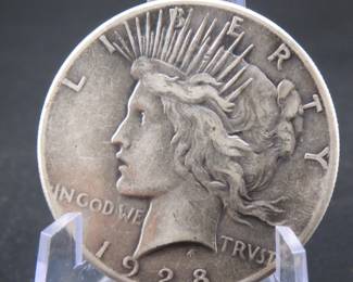 Lot 239. 1928 P Peace Dollar. Key date. 360,649 mintage