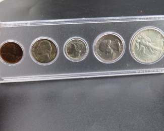 Lot 75. Five-coin 1942 type set including penny, nickel, dime, quarter, and half dollar coins.
