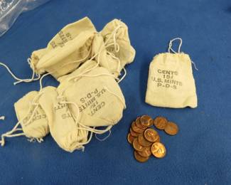 Lot 223. 12 bags of 15 BU pennies each (180 total) from the 1960s and 1970s from the Bureau of the Mint