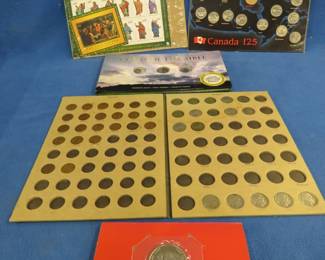 Lot 125. Three novelty coin sets and more: Coins of the Bible (replicas). Canada 125 coins: 12 quarters ands one dollar coin. The Last Super commemorative $5 Marshall Island coin. Coin Stock Book with some pennies, Jefferson Nickels and five Buffalo nickels.