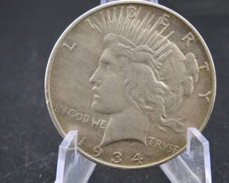 Lot 93. 1934 D Peace Silver Dollar with mint error filled "D".