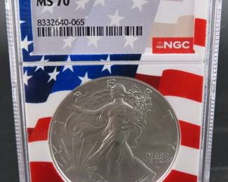 Lot 48. 2024 Silver Eagle $1 coin with one troy oz. of fine silver slabbed and graded NGC MS 70.