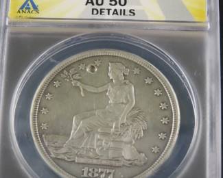 Lot 300. 1877 Trade Dollar Slabbed and Graded ANACS AU50 Details Damaged. Cleaned