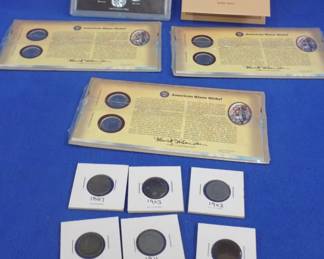 Lot 63. Collectible or old nickels and pennies. Six Barber nickels from 1887 to 1911. One 1934 Buffalo Nickel commemorating Buffalo Bill's Wild West Show. 6 2005m Jefferson Nickels with a Buffalo on the reverse. 5 1943 Steel Cents.