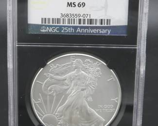 Lot 14. 2008 Silver Eagle $1 coin with one troy oz. of fine silver slabbed and graded NGC MS 69