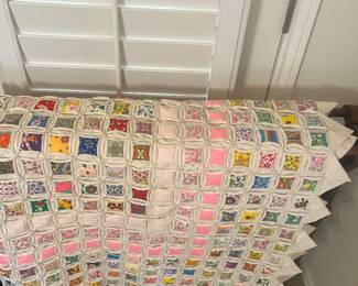 Quilt cathedral window