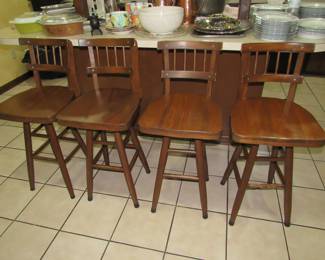 Four solid wood bar stools
