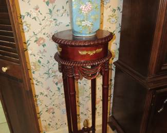 Solid mahogany table with brass ormolu