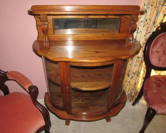 Solid oak carved curio cabinet