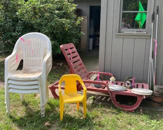 Set of White Plastic Chairs; Child's Yellow Plastic Chair; Red Plastic Chaise Lounge; Shuffle Board Pucks & Sticks