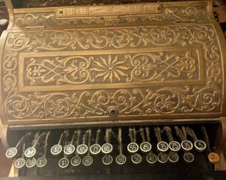 National Cash Register S14880 Late 19th Century early 1910s.  Ornate Brass.  HEAVY -- You'll need two people to move, and this is in the basement!