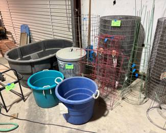 MORE FENCING, TOMATO PLANTERS, AND PEPPER PLANTERS, TWO SMALLER TOTES AND A 150 GALLON COMMERCIAL WATER TANK.