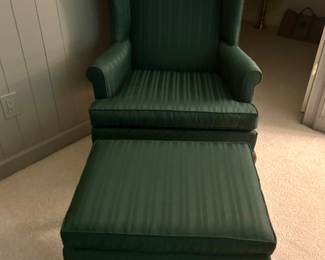 Queen Anne-style wingback chair with a matching ottoman