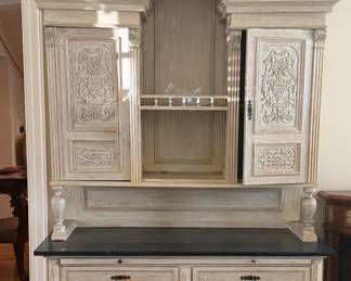Modified Antique breakfront now a cocktail bar