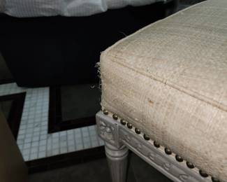 studded armchair, some damage to cushion corner