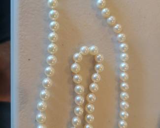 7mm pearls 18" with 14K clasp