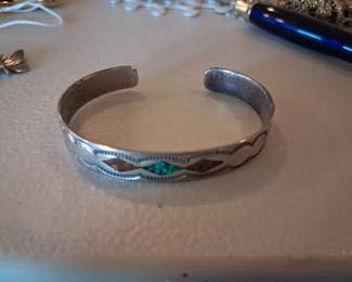 Silver Navajo bracelet with red coral and turquois