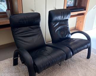 Black leather theater chairs